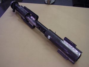 Machined and assembled spreader bar