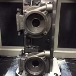 Machined parts mounted on tombstone.Doosan HP 4000 Horizontal Machining Center