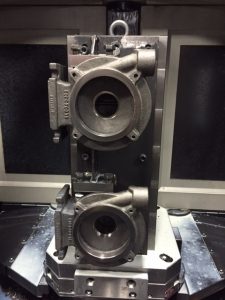 Machined parts mounted on tombstone.Doosan HP 4000 Horizontal Machining Center