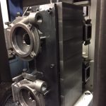 Machined parts mounted on tombstone.Doosan HP 4000 Horizontal Machining Center