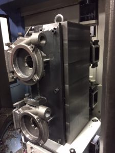 Machined parts mounted on tombstone.Doosan HP 4000 Horizontal Machining Center